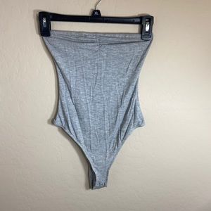 Gray strapless body suit